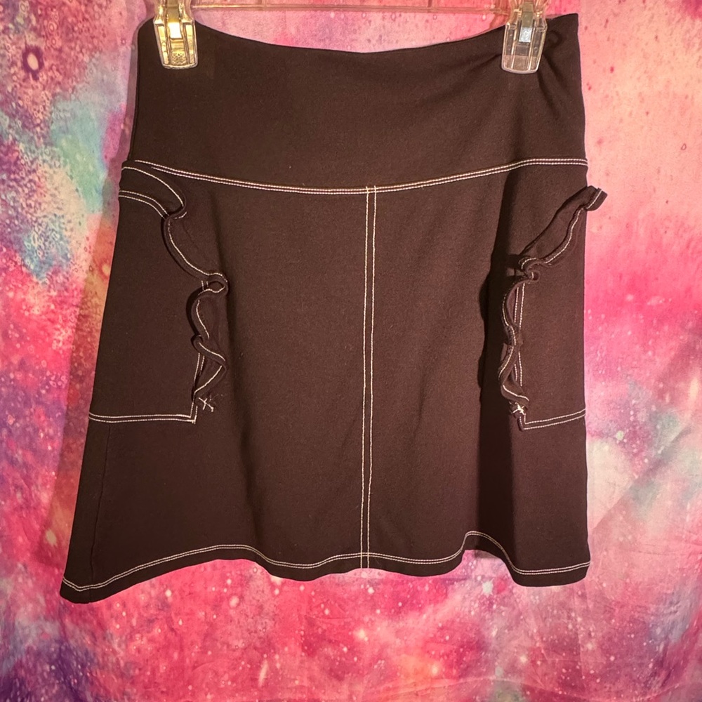 Black Mini Skirt with White Stitching and Ruffle Details